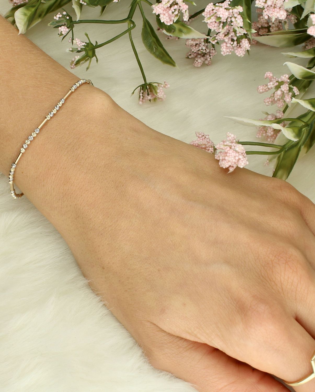 Bransoletka złota z grawerowanymi kuleczkami próba 375, BR 7582 375 Złota bransoletka wykonana z 14 karatowego żółtego złota. Bransoletka to idealny pomysł na prezent. 1.jpg